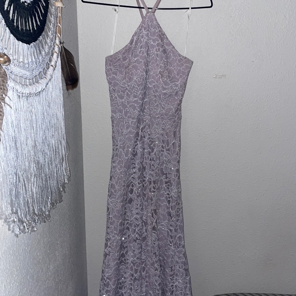 Beautiful long lavender dress with a cross back pattern and a sleeveless front